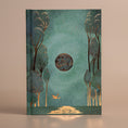 Load image into Gallery viewer, Front of the moon journal 2025 in green with gold outlines
